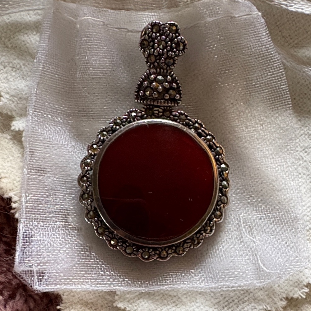 Elegant Silver and Red Pendant